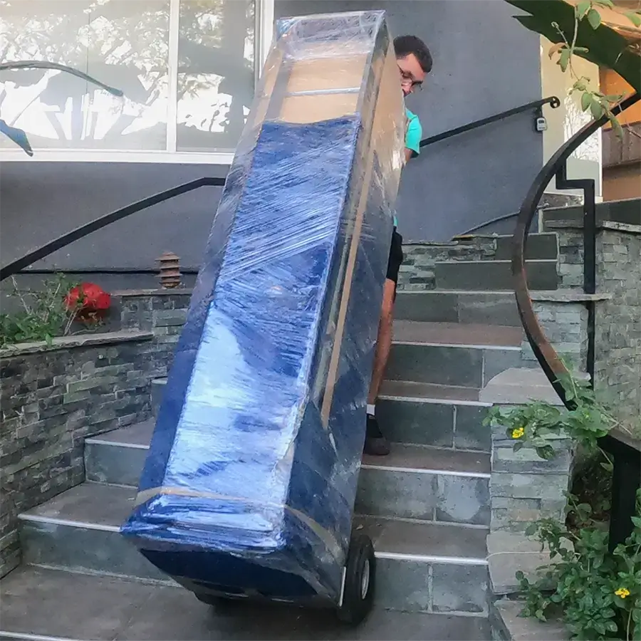 image of packed furniture being moved